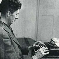 George Orwell at his portable manual Remington typewriter.